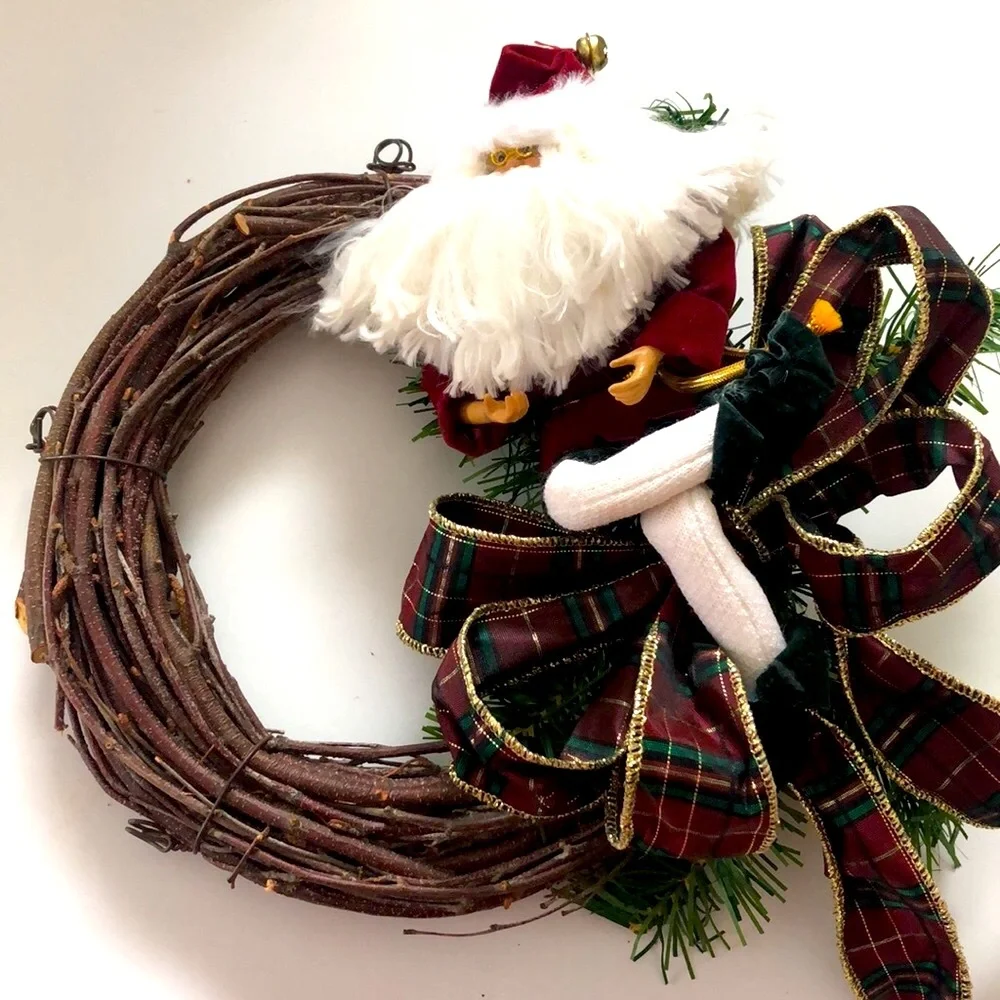 8” grapevine wreath with Santa, ribbon and greenery